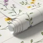 Cute floral wallpaper with green vine trails and pink, purple and yellow watercolor flowers on cream