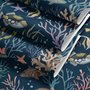 Aquarium fish tank wallpaper repeat with tropical fish, coral, seaweed, shells and bubbles on deep navy blue