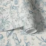 Cute cats wallpaper with dusty blue toile kittens, roses and garden scenes on warm cream