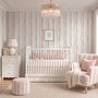 Blue and light blue wallpaper with hand-painted vertical watercolour stripes on a clean white ground