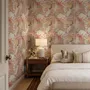 Pink tropical wallpaper with ivory fan palms, orchids, coral blossoms and sage foliage on dusty rose