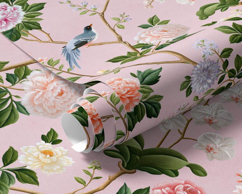 Cute pink wallpaper with birds, tan branches, green leaves and ivory, coral and lilac flowers.