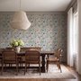 Modern coastal wallpaper with watercolour tropical fish, coral, seaweed, shells and bubbles on light aqua-blue