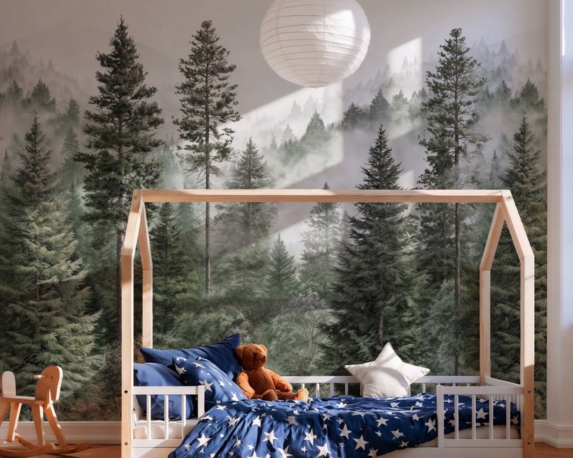 Misty mountain wallpaper mural with tall pine trees, layered green forest and pale foggy ridges