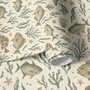 Watercolor fish wallpaper with grey-blue fish, seafoam seaweed, starfish and bubbles on warm cream