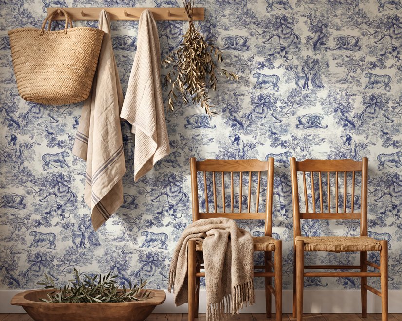 Jungle wallpaper with animals in navy toile, showing tigers, elephants and monkeys on an ivory cream ground