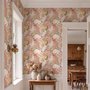 Pink tropical wallpaper with ivory fan palms, orchids, coral blossoms and sage foliage on dusty rose
