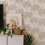 Muted sandy taupe palm trees and pale foliage on a creamy ivory ground tropical wallpaper