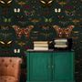 Colorful Butterfly Patterns on Green Background Wallpaper Mural