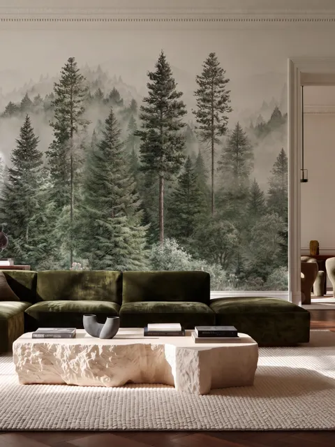 Misty mountain wallpaper mural with tall pine trees, layered green forest and pale foggy ridges