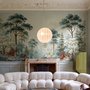 Vintage forest wallpaper mural with blue-grey trees, ivory blossom, red plants and toadstools around a misty path