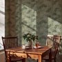 Light green and blue wallpaper with painted sage bamboo canes, olive leaves and pale celadon foliage ground
