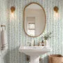 Blue floral stripe wallpaper with pale sky-blue bell flowers, green vines and sage bands on white