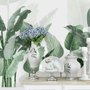 Papier peint panoramique de feuilles tropicales vertes et fraîches