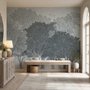 Light gray wallpaper mural with misty forest trees, falling leaves and birds