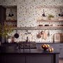 Cute spring wallpaper with pressed ivory, pink, blue and yellow wildflowers on a white ground