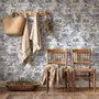 Jungle wallpaper with animals in navy toile, showing tigers, elephants and monkeys on an ivory cream ground