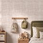 Soft brown wallpaper with pale beige gingham checks on a warm cream off-white ground