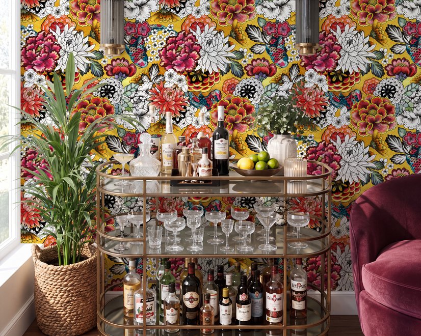 Floral and fish wallpaper with coral blooms, teal fish and black white flowers on metallic mustard-gold ground