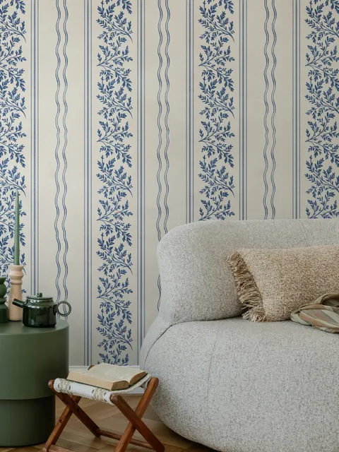 Blue wallpaper with indigo botanical stripework, pinstripes and dotted borders on warm cream parchment