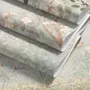 Watercolour nature wallpaper with lilac wisteria, pale trees, sage foliage and small songbirds around a misty clearing