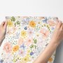 Spring floral wallpaper with pastel watercolour flowers and sage leaves on a clean white ground