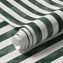 Green striped minimalist wallpaper with vertical deep forest green bands on a soft warm ivory ground.