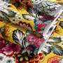Floral and fish wallpaper with coral blooms, teal fish and black white flowers on metallic mustard-gold ground