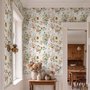 Watercolour floral wallpaper with sage leaves, blush and ochre flowers on a white ground