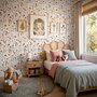 Cute spring wallpaper with pressed ivory, pink, blue and yellow wildflowers on a white ground