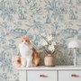 Cute cats wallpaper with dusty blue toile kittens, roses and garden scenes on warm cream