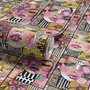 Bold wallpaper for powder room with pop art female faces, pink flowers, black comic panels, mustard, teal and fuchsia details