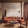 Bar wallpaper with cream tile grid, dusty rose arches, illustrated wine bottles, fruit and café still lifes