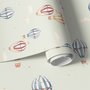 Watercolor blue wallpaper with hot air balloons, cream clouds and peach stars on pale sage green