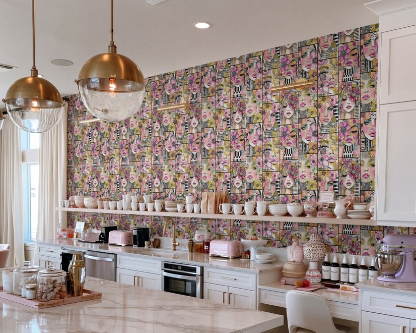 Bold wallpaper for powder room with pop art female faces, pink flowers, black comic panels, mustard, teal and fuchsia details