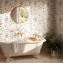 Watercolour floral wallpaper repeat with navy, blue, blush and peach wildflowers on warm cream