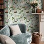 Chinoiserie wallpaper with peach birds, orchids and peonies on a pale duck egg blue ground