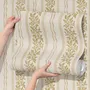 Gold and white wallpaper with antique gold leafy sprig stripes on parchment cream