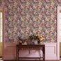 Bold wallpaper for powder room with pop art female faces, pink flowers, black comic panels, mustard, teal and fuchsia details