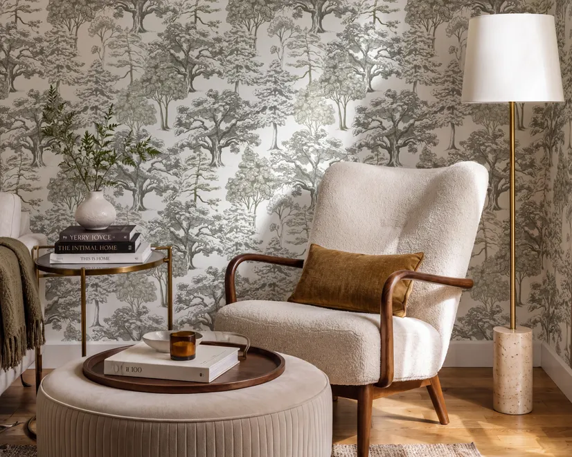 Monochrome wallpaper with grey tree toile on a clean white ground
