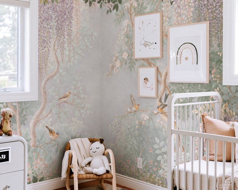Watercolour nature wallpaper with lilac wisteria, pale trees, sage foliage and small songbirds around a misty clearing