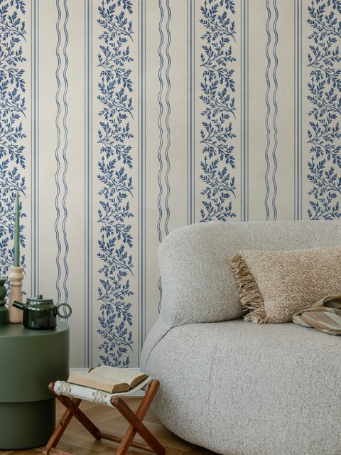 Blue wallpaper with indigo botanical stripework, pinstripes and dotted borders on warm cream parchment