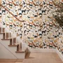 Zoomie kids wallpaper with painted dog breeds in tan, brown, black and grey on white