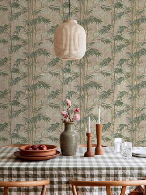Vintage bamboo wallpaper with sage and smoky blue-green leaves on a warm taupe ground