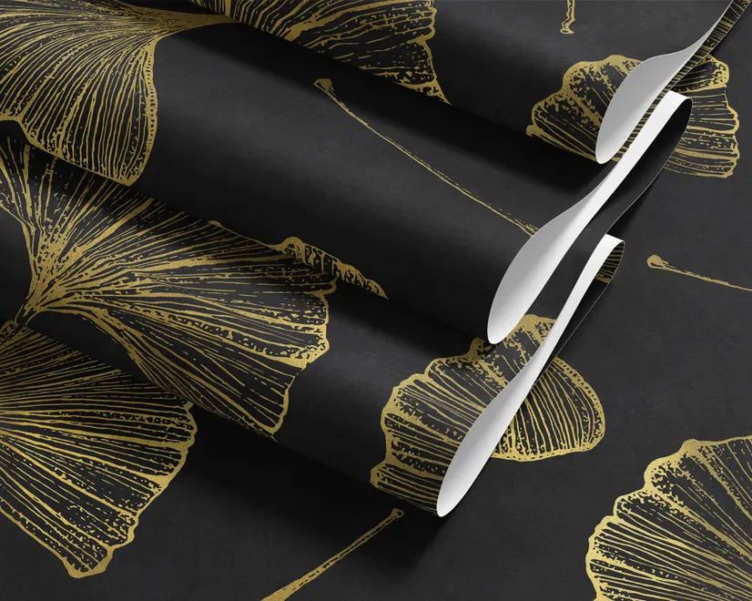 Black wallpaper with antique metallic gold ginkgo leaves on a mottled charcoal ground