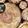 Papier peint souches de bois empilées