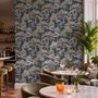 Navy wallpaper with warm ivory and taupe grey toile tree repeat on deep slate blue ground