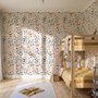 Watercolour floral wallpaper repeat with navy, blue, blush and peach wildflowers on warm cream