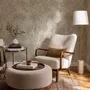 Abstract taupe and greige wallpaper with creamy white oval brush marks in flowing currents