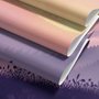 Stag mountain wallpaper with a navy deer silhouette, lavender pine ridges and a pale golden sun